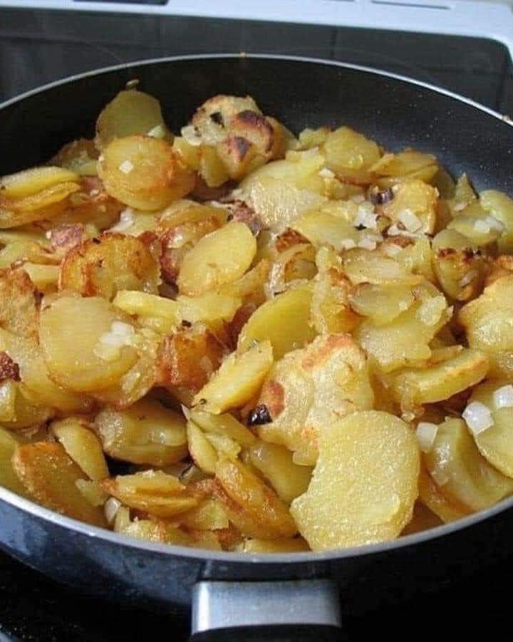 Fried Potatoes Onions And Smoked Polish Sausage